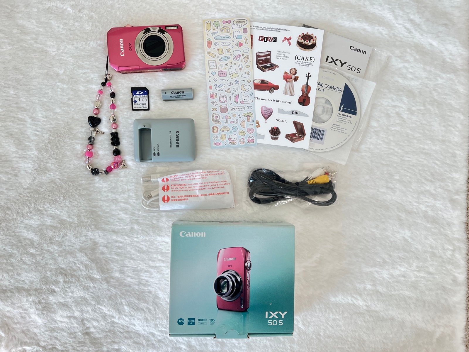 📷 Used Canon pink Ixy50S digital camera 🔥🌸